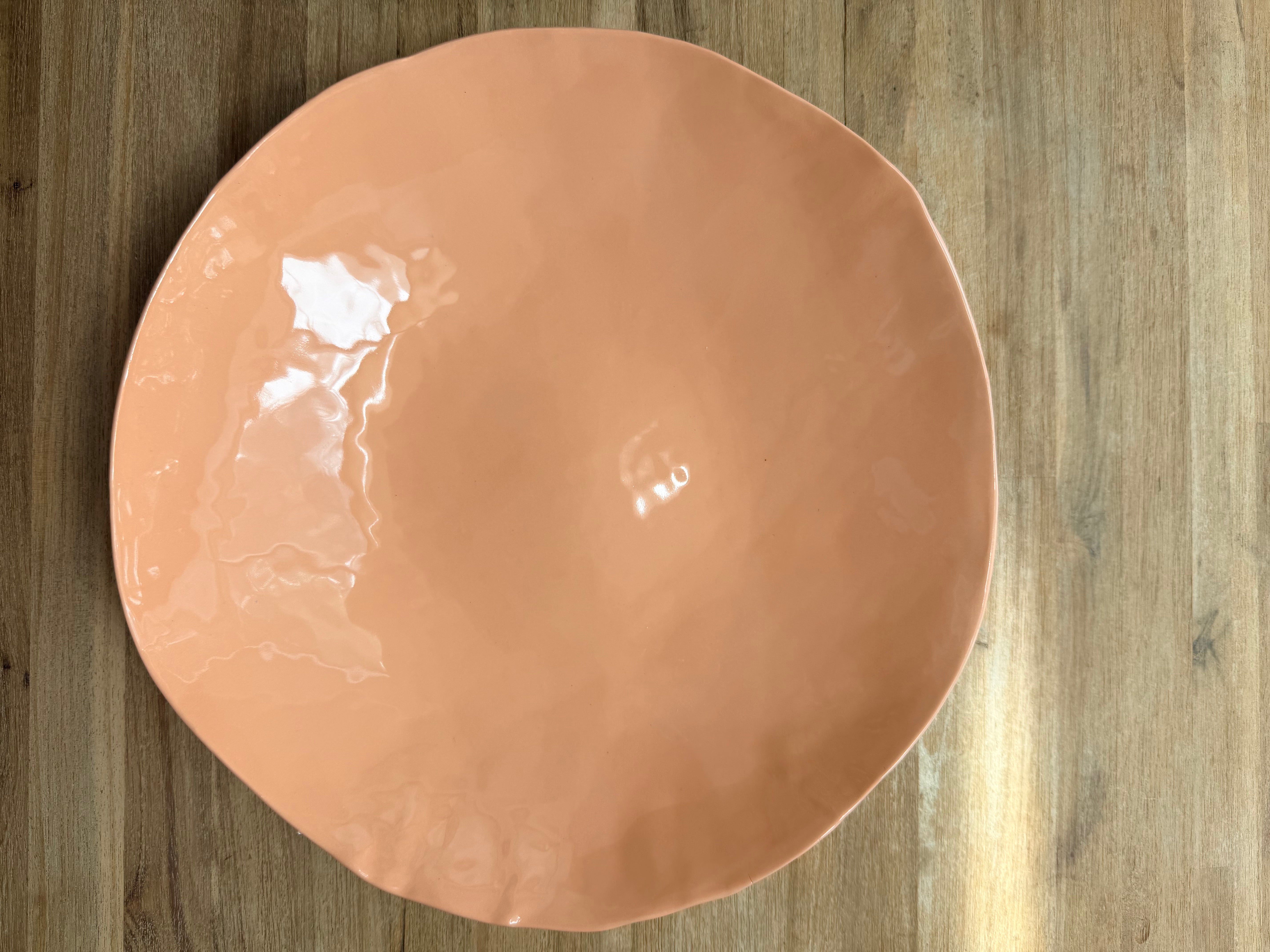 Coral glazed ceramic bowl