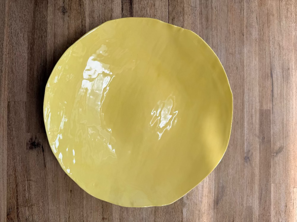 Butter glazed ceramic bowl
